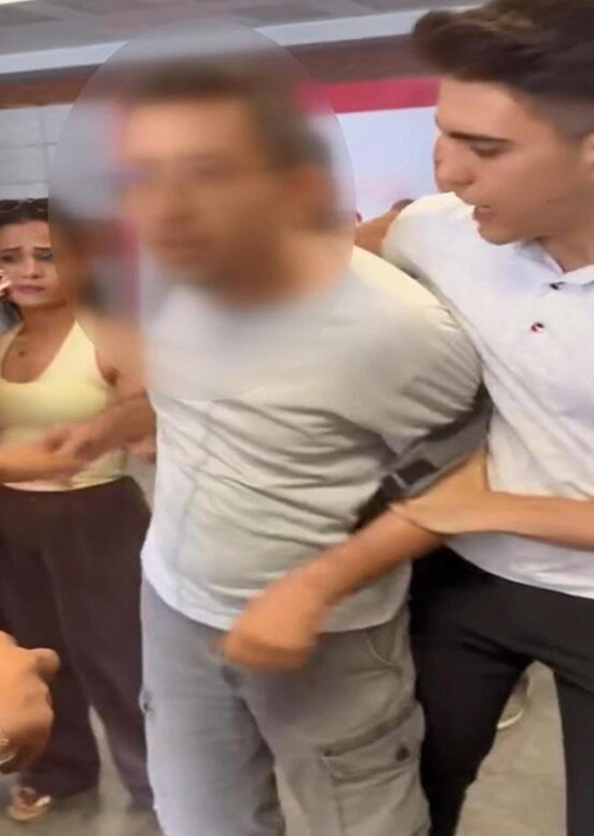 Şişli&rsquo;de metrob&uuml;s istasyonunda gizlice kadın fotoğrafı &ccedil;eken ş&uuml;pheliye vatandaş m&uuml;dahale etti 2