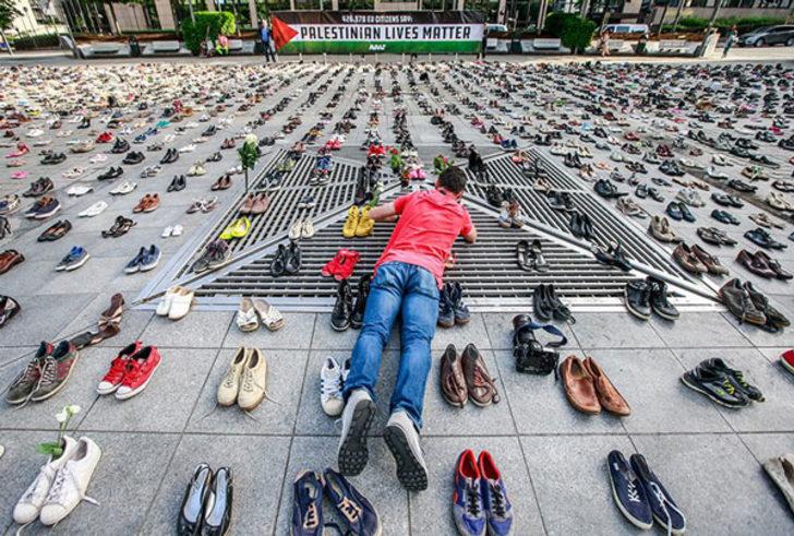 Tüyleri diken diken eden eylem! Tam tamına 4500 çift ayakkabı...  G5