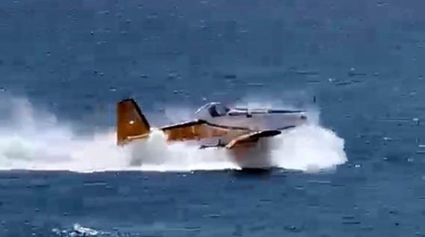 &Ccedil;anakkale&rsquo;de denizden su alan yangın s&ouml;nd&uuml;rme u&ccedil;ağının kalkış yapamadığı anlar ortaya &ccedil;ıktı