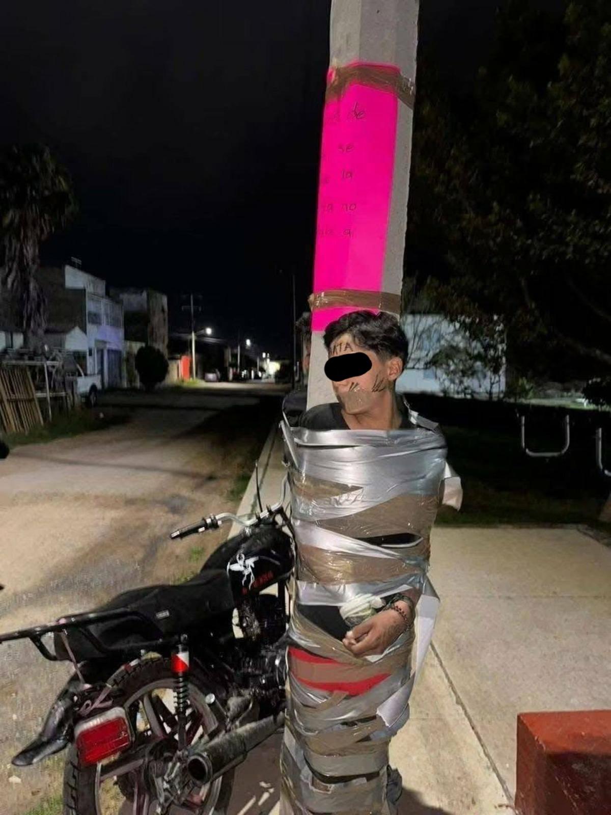 Batman gibi hırsız avlayıp direğe bağladı! G&ouml;r&uuml;nt&uuml;ler g&uuml;ndem oldu 2