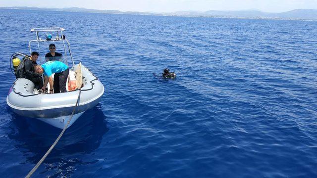 Ayvalık'ta batan teknede kaybolan 2 kişiyi JAK timleri de arıyor