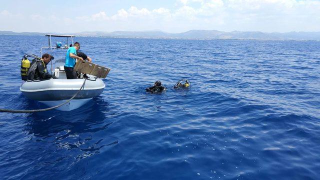 Ayvalık'ta batan teknede kaybolan 2 kişiyi JAK timleri de arıyor