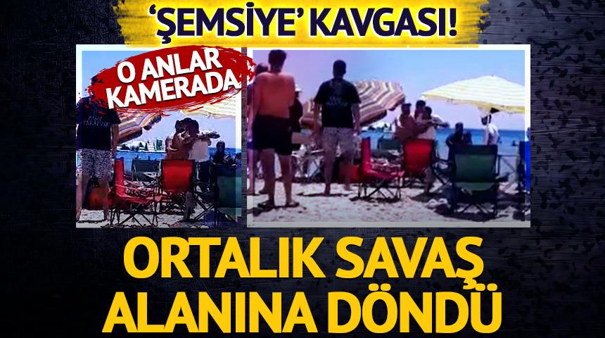 &Ccedil;eşme'de 'şemsiye' kavgası! Ortalık savaş alanına d&ouml;nd&uuml;: O anlar kamerada