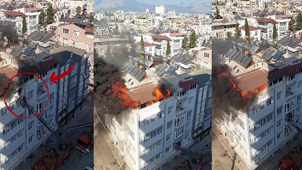 Terasta çıkan yangından kurtulmak için apartmanın duvarında asılı kaldılar