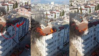 Terasta çıkan yangından kurtulmak için apartmanın duvarında asılı kaldılar