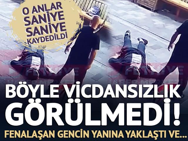 B&ouml;ylesi g&ouml;r&uuml;lmedi! Fenalaşarak yere yığılan gencin parasını &ccedil;aldı
