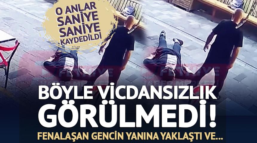 B&ouml;ylesi g&ouml;r&uuml;lmedi! Fenalaşarak yere yığılan gencin parasını &ccedil;aldı