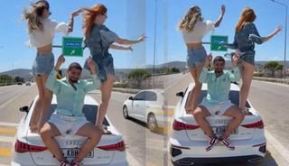 İzmir-&Ccedil;eşme Otoyolu'nda şoke eden g&ouml;r&uuml;nt&uuml;ler! Ara&ccedil; &uuml;zerinde dans edip paylaştılar