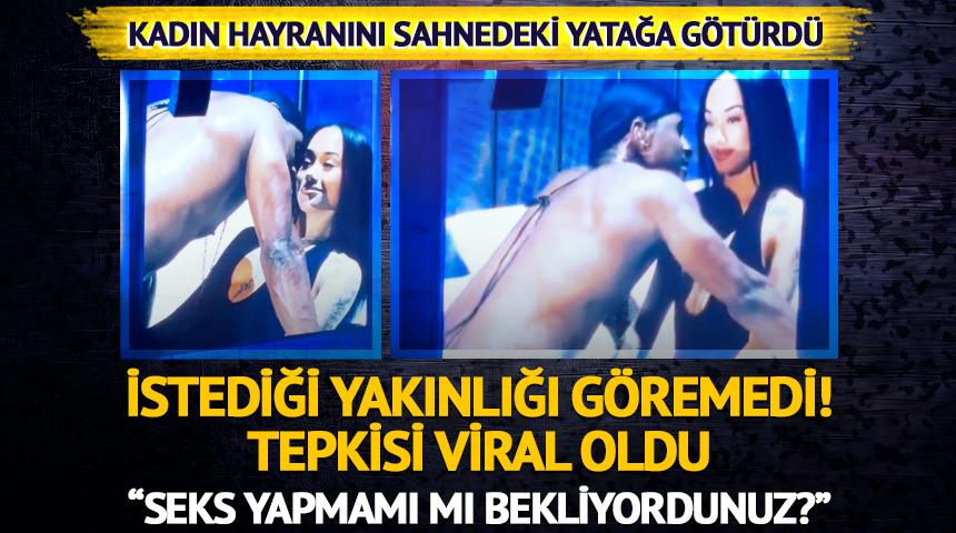Kadın hayranını sahnedeki yatağa götürdü! Yakınlığını beğenmeyince...