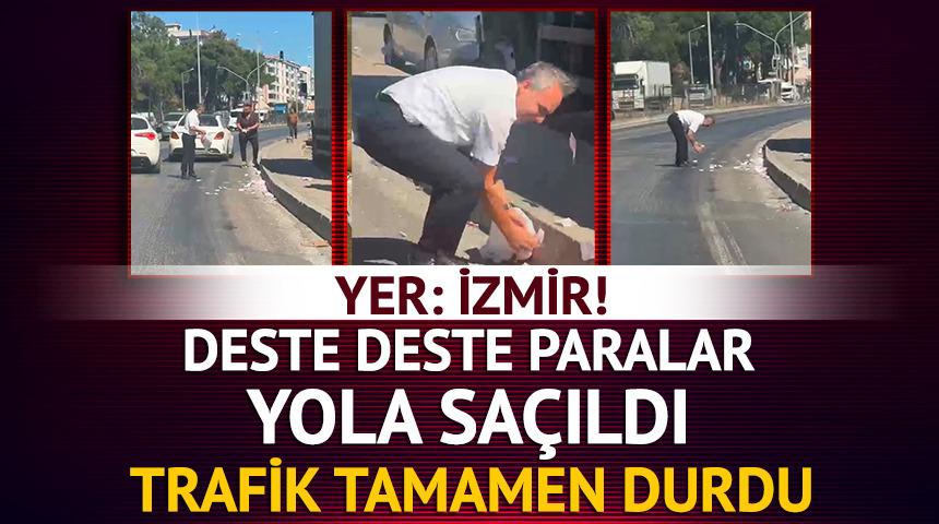 Yer: İzmir! Deste deste paralar yola sa&ccedil;ıldı, trafik tamamen durdu