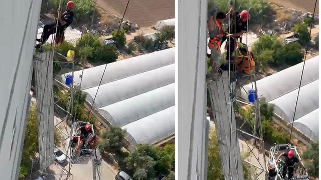 Halatı kopan iskelede mahsur kalan 2 işçiyi itfaiye kurtardı