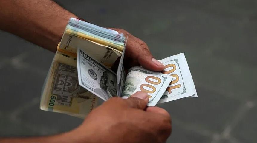 İran'da dolar serbest piyasada tarihinin en y&uuml;ksek seviyesine &ccedil;ıktı