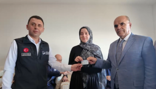 Ahıska T&uuml;rk&uuml; aileler Elazığ&rsquo;daki yeni evlerine kavuştu: T.C. Kimlik Kartları da teslim edildi