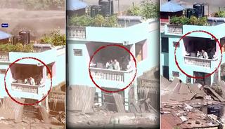 Nepal'de selin ortasında tek &ccedil;ıkışları balkon oldu: &Uuml;&ccedil; kişilik aile b&ouml;yle yardım bekledi