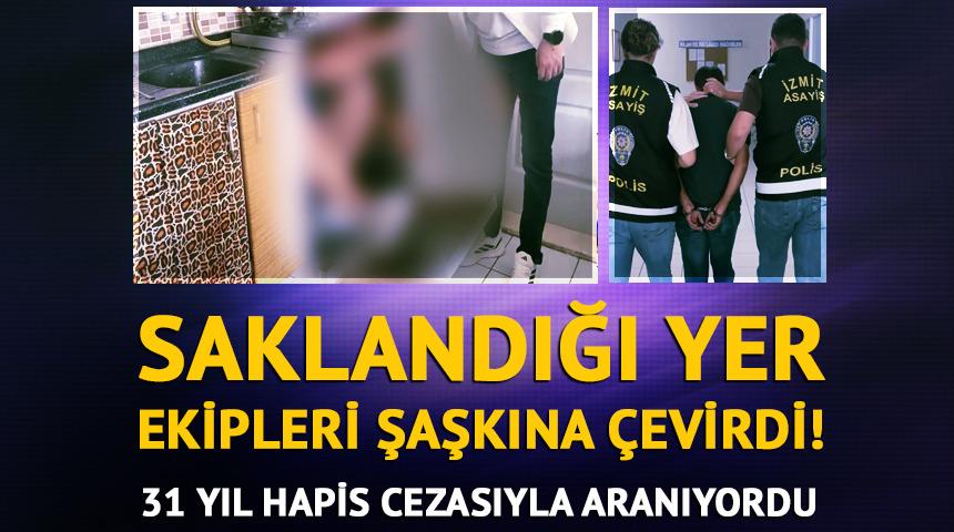 31 yıl hapis cezasıyla aranıyordu, bulaşık makinesinde saklanırken yakalandı