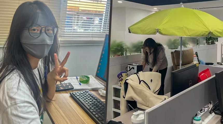 Ofis &ccedil;alışanları şemsiye a&ccedil;ıp maske takıyor! İşte şaşırtan nedeni