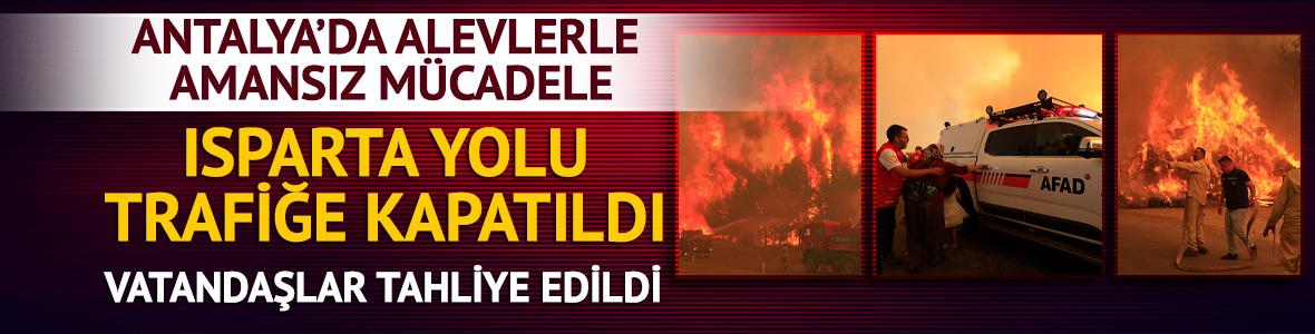 Antalya'da alevlerle m&uuml;cadele s&uuml;r&uuml;yor! Isparta yolu trafiğe kapatıldı