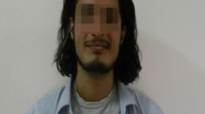 İnterpol tarafından mavi b&uuml;ltenle aranan kişi İzmir'de yakalandı