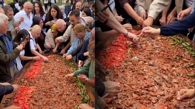 Bursa'da ilginç görüntü! Festivalde onlarca kişi tek tabaktan elleriyle iskender yedi