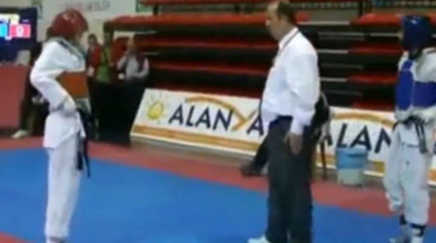 Milli hakem yanarak can verdi