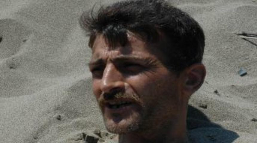 Sıcak kumda şifa arıyorlar