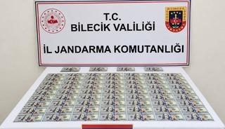 Bilecik&rsquo;te otomobilde 202 adet sahte dolar ele ge&ccedil;irildi