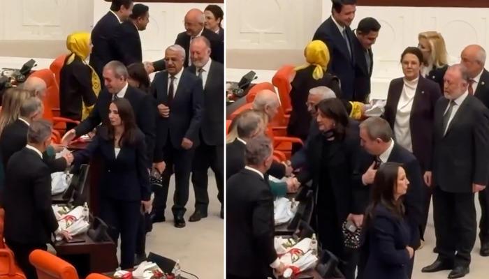 Meclis&rsquo;te dikkat &ccedil;eken anlar! DEM Partililer Bah&ccedil;eli ile tokalaşmak i&ccedil;in sıraya girdi
