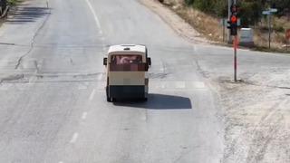 Kırmızı ışıkta geçip polisleri görünce yön değiştiren sürücü polis dronundan kaçamadı
