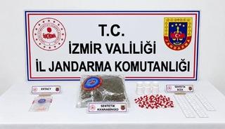 İzmir&rsquo;de jandarmadan uyuşturucu ve ka&ccedil;ak sigara operasyonu: 2 tutuklama