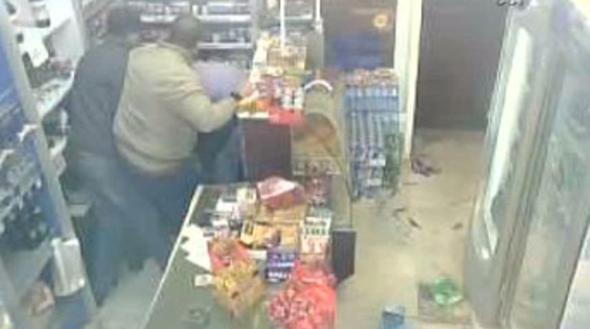 Market sahibine dayak kamerada