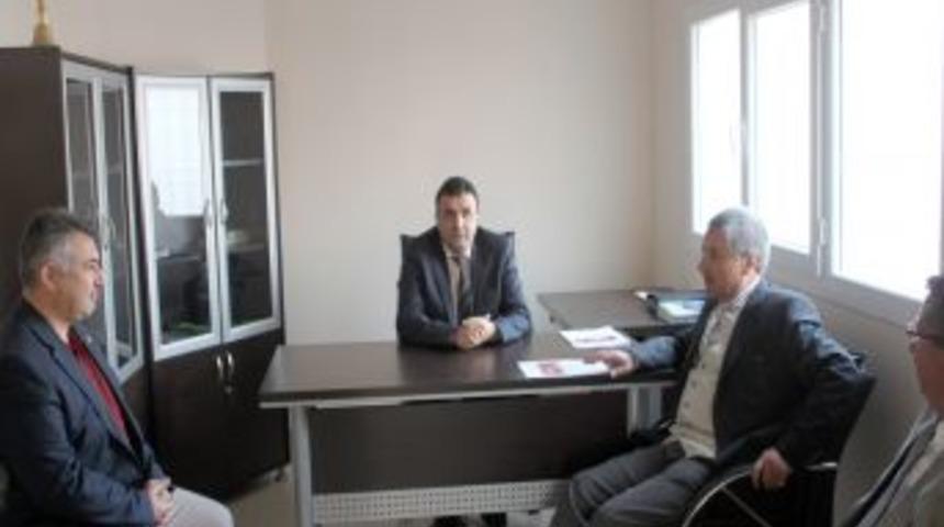 İl&ccedil;e protokol&uuml; ve esnaf, Damla Okuma Salonu'nda bir araya geldi