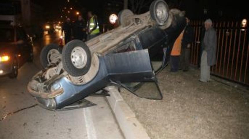 Yozgat'ta iş makinesinin &ccedil;arptığı otomobil takla attı