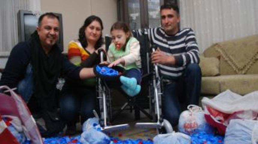 7 yaşındaki Ilgın'ın yüzü mavi kapaklarla güldü