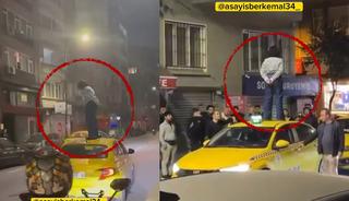 Yer: Şişli... Taksinin &uuml;zerine &ccedil;ıkıp dakikalarca durdu: Kendisini tekmelerle savundu!