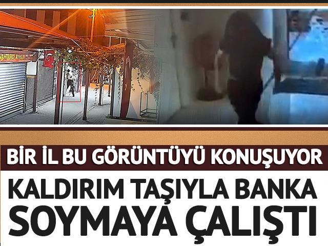 Kaldırım taşıyla banka soymaya çalıştı! Eli boş döndü