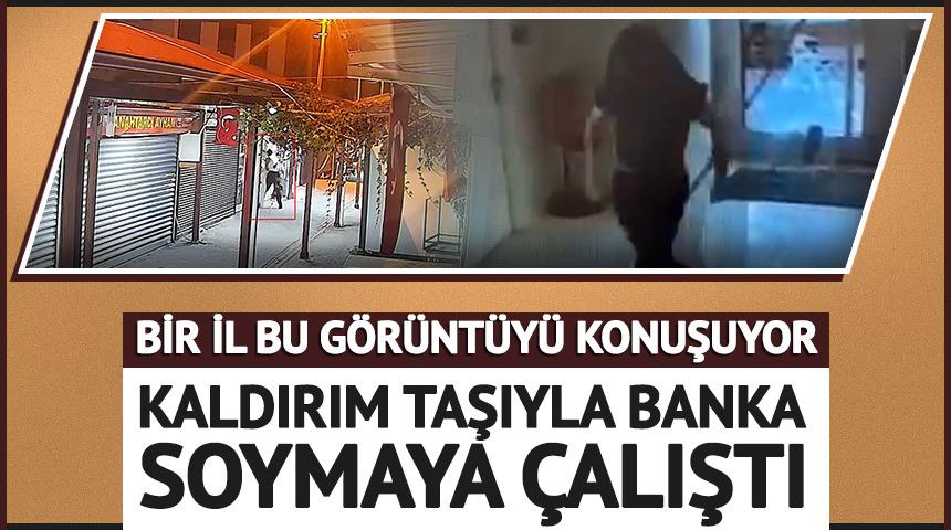 Kaldırım taşıyla banka soymaya &ccedil;alıştı! Eli boş d&ouml;nd&uuml;