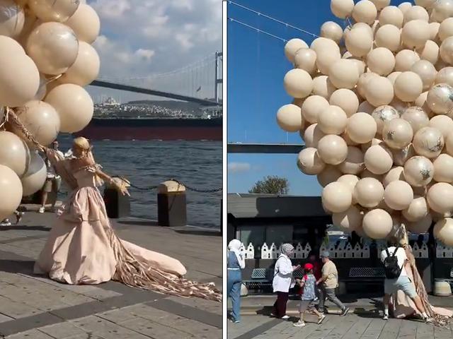 İstanbul'da fotoğraf &ccedil;ekimi kabusa d&ouml;nd&uuml;! Dev balonlar kadını b&ouml;yle s&uuml;r&uuml;kledi