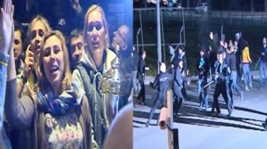 Fenerbah&ccedil;e takımı yurda d&ouml;nd&uuml;, taraftarlar polisle &ccedil;atıştı