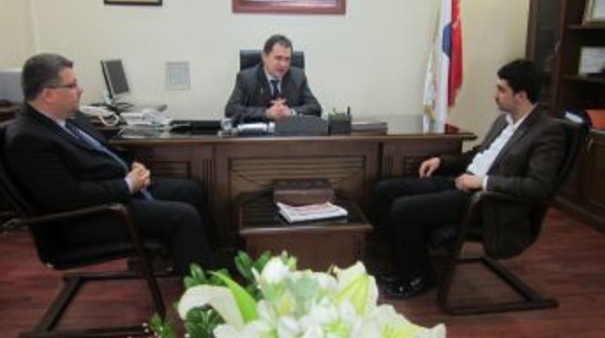 &Uuml;NİŞAD'dan polise kutlama ziyareti