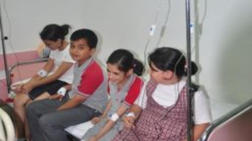 Fethiye'de 16 &ouml;ğrenci s&uuml;tten zehirlendiği iddiası ile hastaneye gitti