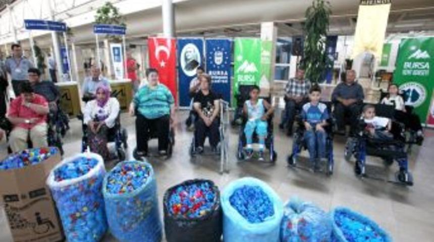 Kapaklarla 30 Engelli Ak&uuml;l&uuml; Araca Kavuştu