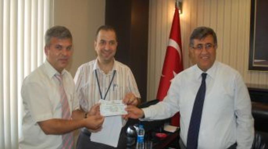 THK, Fitre Ve Zekat Gelirlerinin Yarısını SYDV'ye Teslim Etti