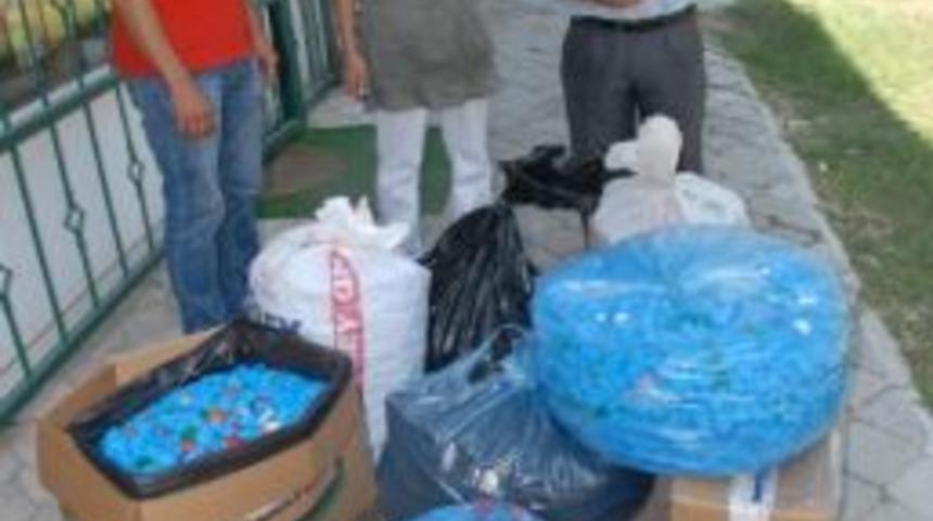 Fethiye'de Omurilik Fel&ccedil;lileri İ&ccedil;in 2,5 Ton Mavi Kapak Toplandı