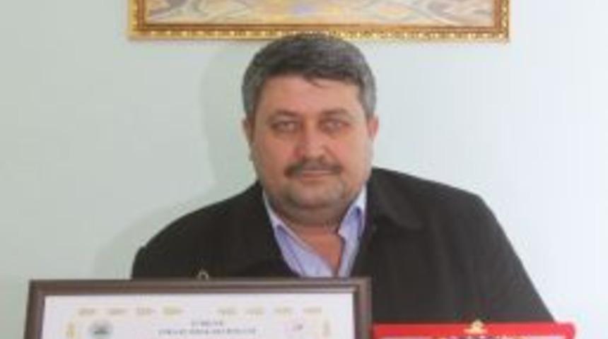 Başkan Okur’a Şeref Belgesi Verildi