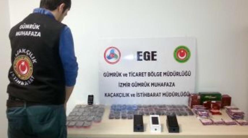 Adnan Menderes Havalimanı'nda Ka&ccedil;ak Telefonlar Ele Ge&ccedil;irildi