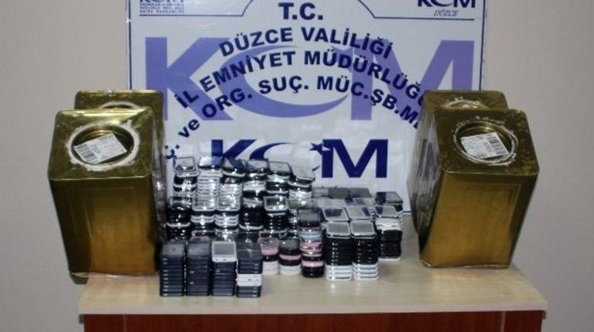 Zeytin Tenekelerinden Ka&ccedil;ak Cep Telefonu &Ccedil;ıktı