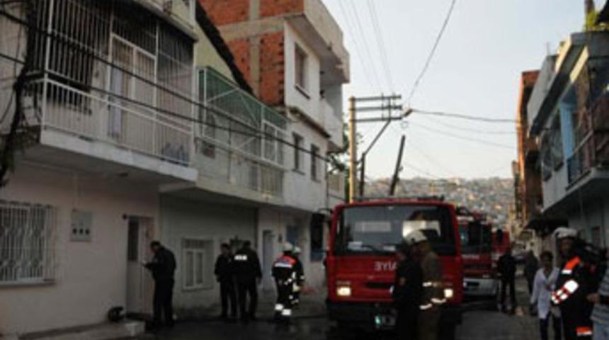 Yangın &ccedil;ıkan evde kanlı bı&ccedil;ak