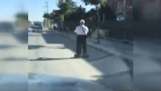 Yaşlı adamın hoverboard keyfi