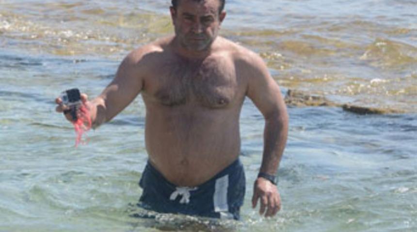 &Ccedil;eşme'de balıklar vatandaşlara saldırdı