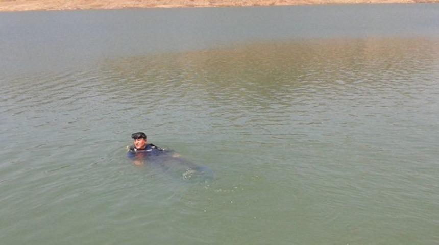 Serinlemek için girdiği barajda boğuldu